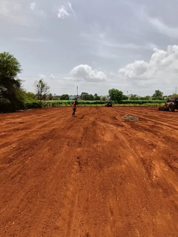 Excavation and slope grading work during football ground base preparation